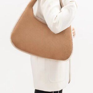 Women's niche contrast color plush handbag for women